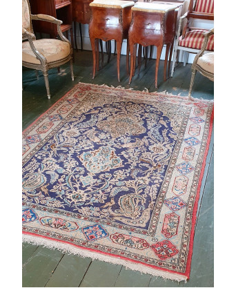 A Persian Qum Carpet A Persian Qum Carpet