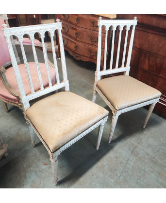 A pair of French Hall Chairs 