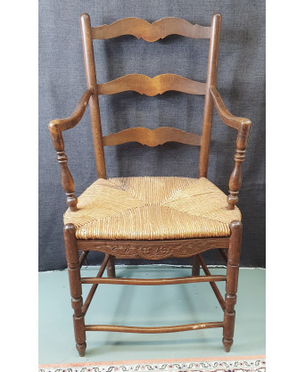 A tall French Provincial Armchair A tall French Provincial Armchair