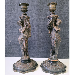 A pair of Empire Candlesticks 