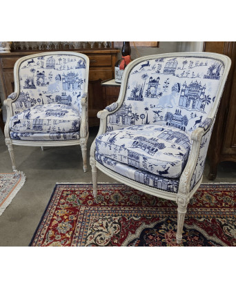 A pair of Parisian Louis XVI Bergere Armchairs A pair of Parisian Louis XVI Bergere Armchairs