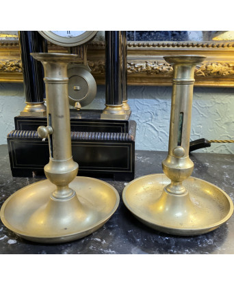 A pair of French Provincial Candlesticks 