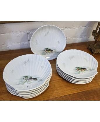 A set of 12 Limoges Fish Plates