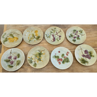 A set of 8 French Majolica Dessert Plates