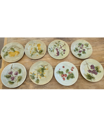 A set of 8 French Majolica Dessert Plates