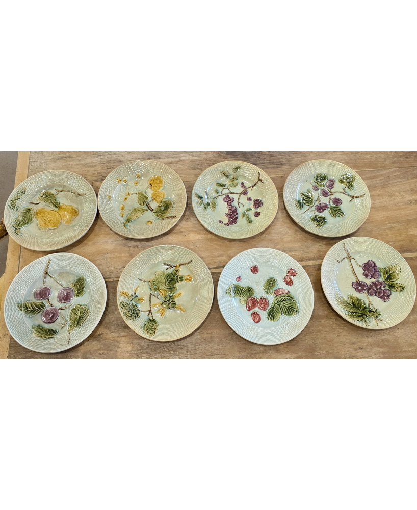 A set of 8 French Majolica Dessert Plates