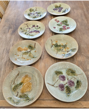 A set of 8 French Majolica Dessert Plates