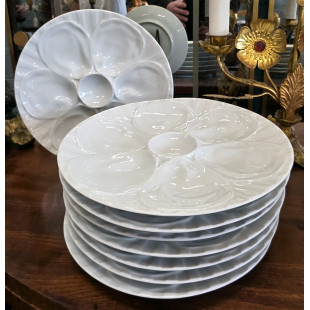 A set of 8 French Oyster Plates 