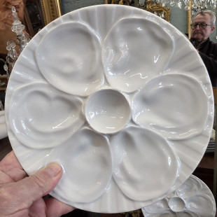 A set of 8 French Oyster Plates 