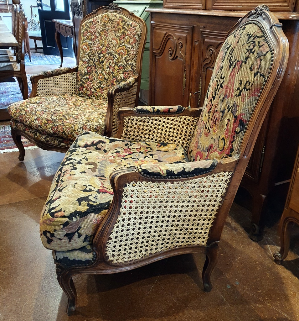 A large pair of Louis XV Bergere Armchairs
