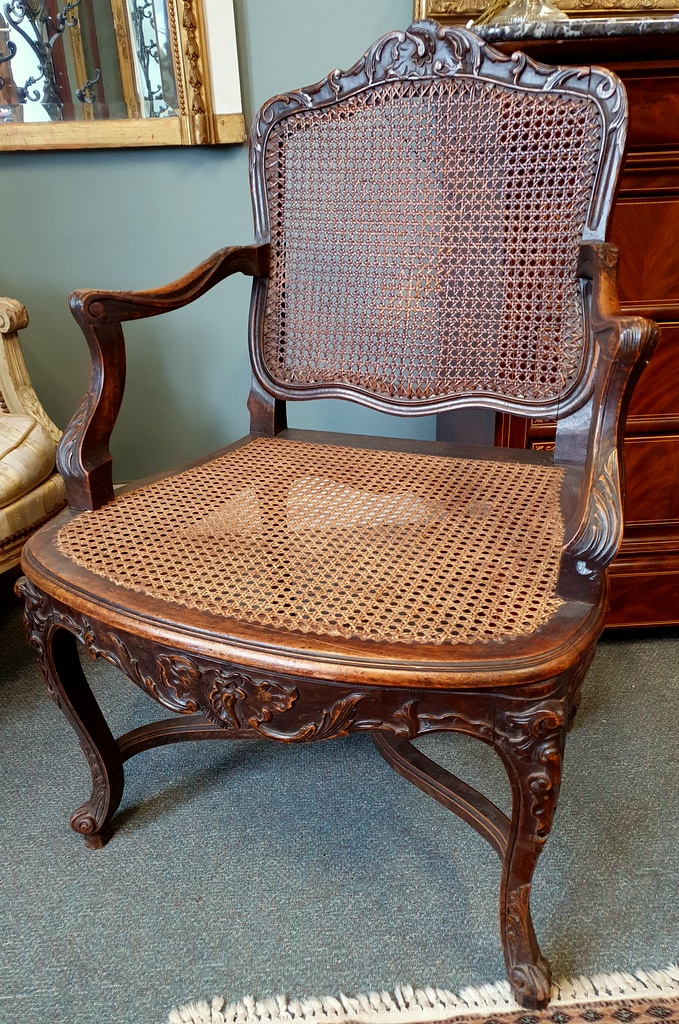 A pair of French Regence Armchairs