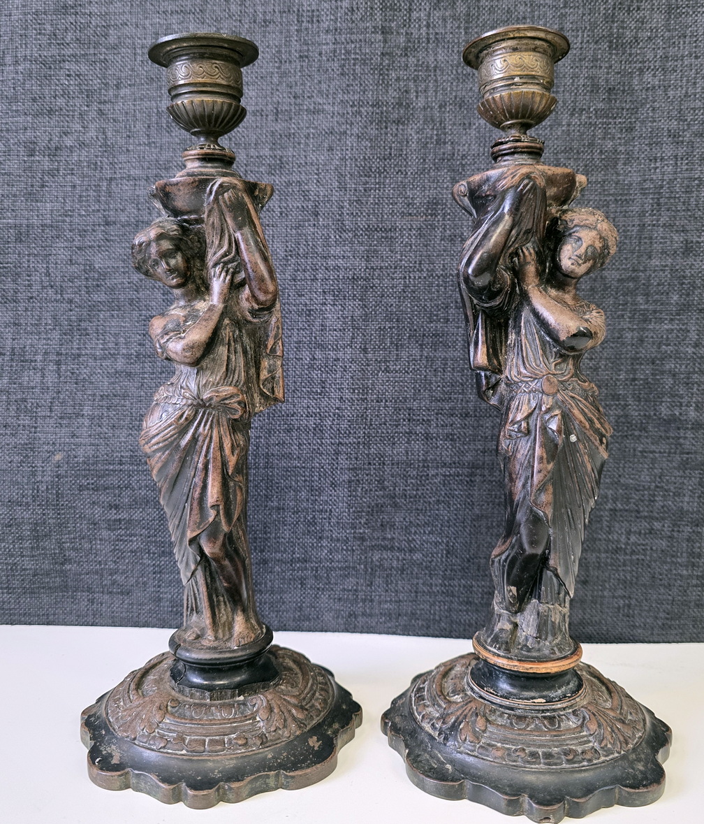 A pair of Empire Candlesticks 