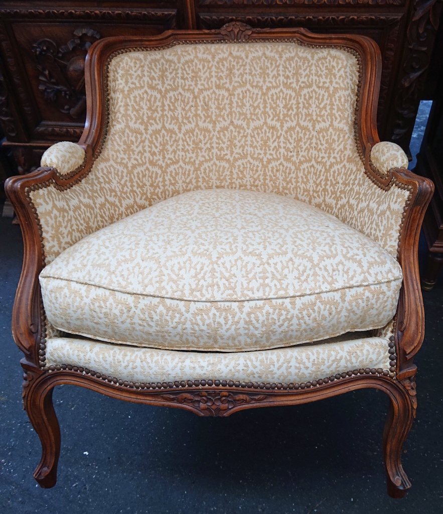 A pair of French "Bergeres en Gondole" Armchairs