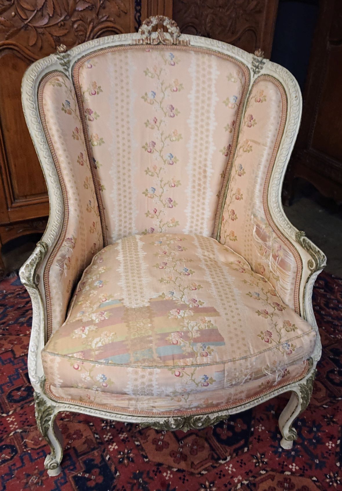 A Parisian Louis XV Wing-back Armchair