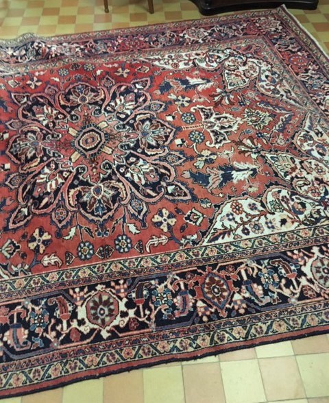 A large Persian Ahar Design Rug