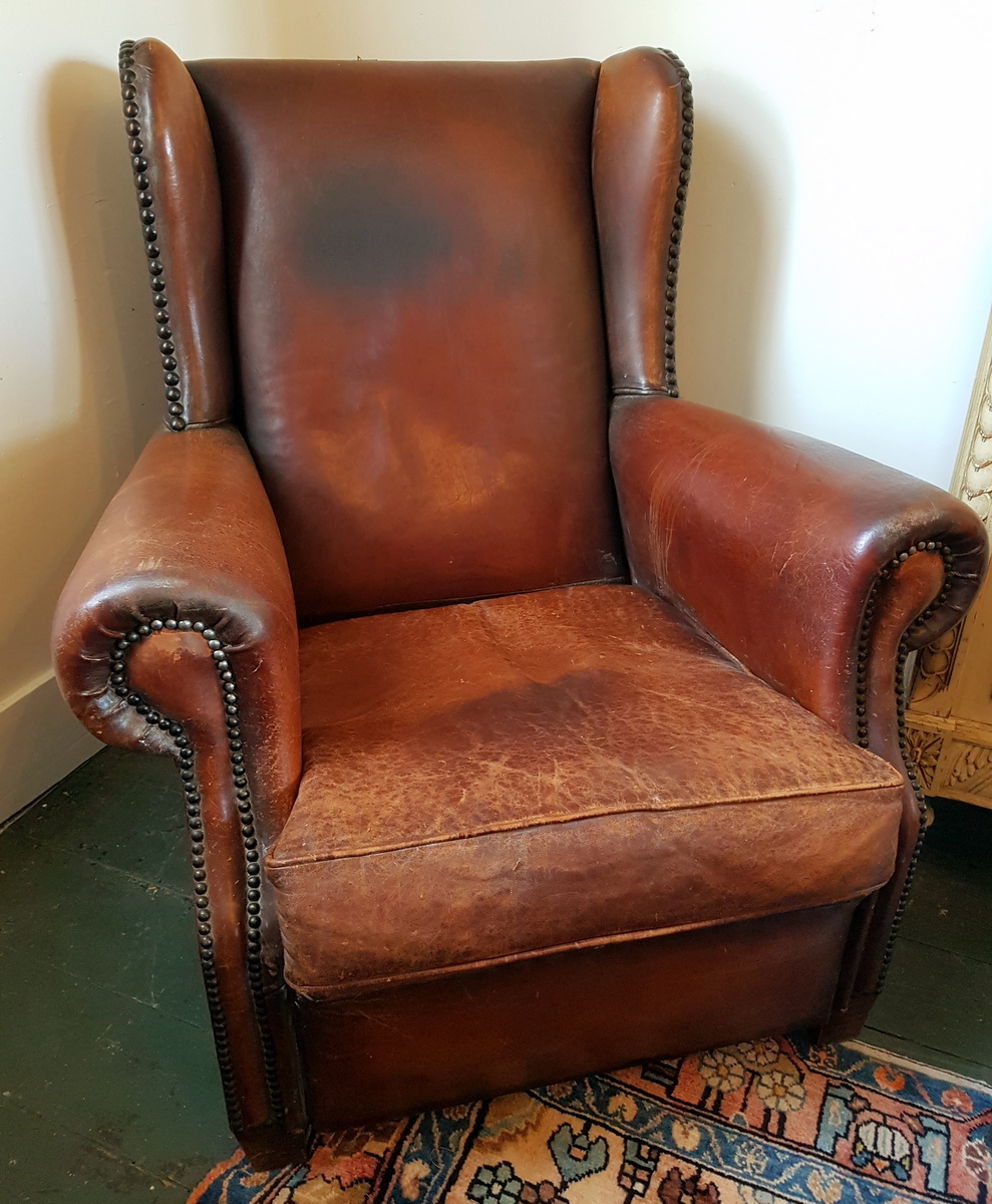 A Pair of Leather Club Armchairs