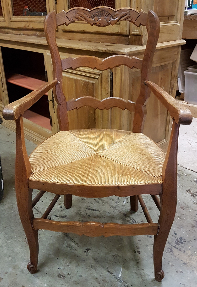 A pair of French Provincial Armchairs