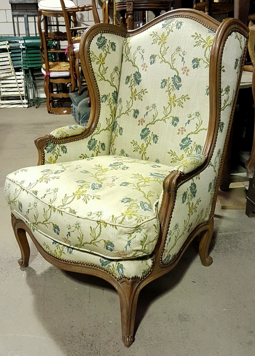 A large Louis XV Bergere Wing Armchair