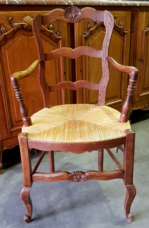 A pair of French Provincial Armchairs