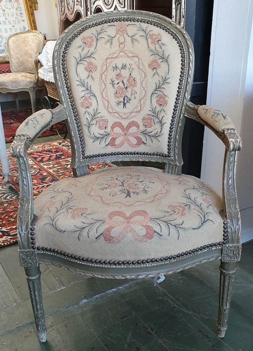 Two pairs of Louis XVI Armchairs