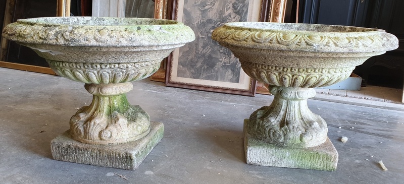 A pair of Medici Stone Urns