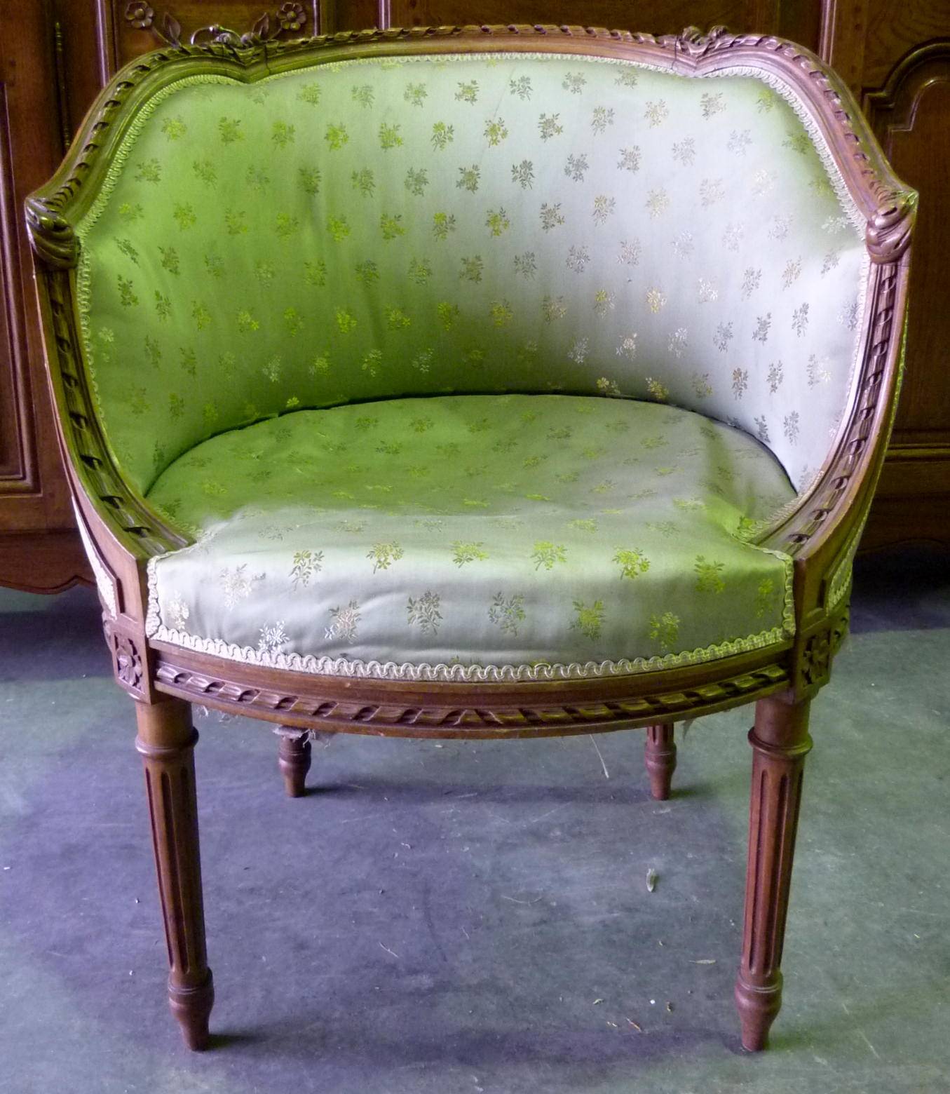 A pair of 'Bergères en Corbeille' Armchairs
