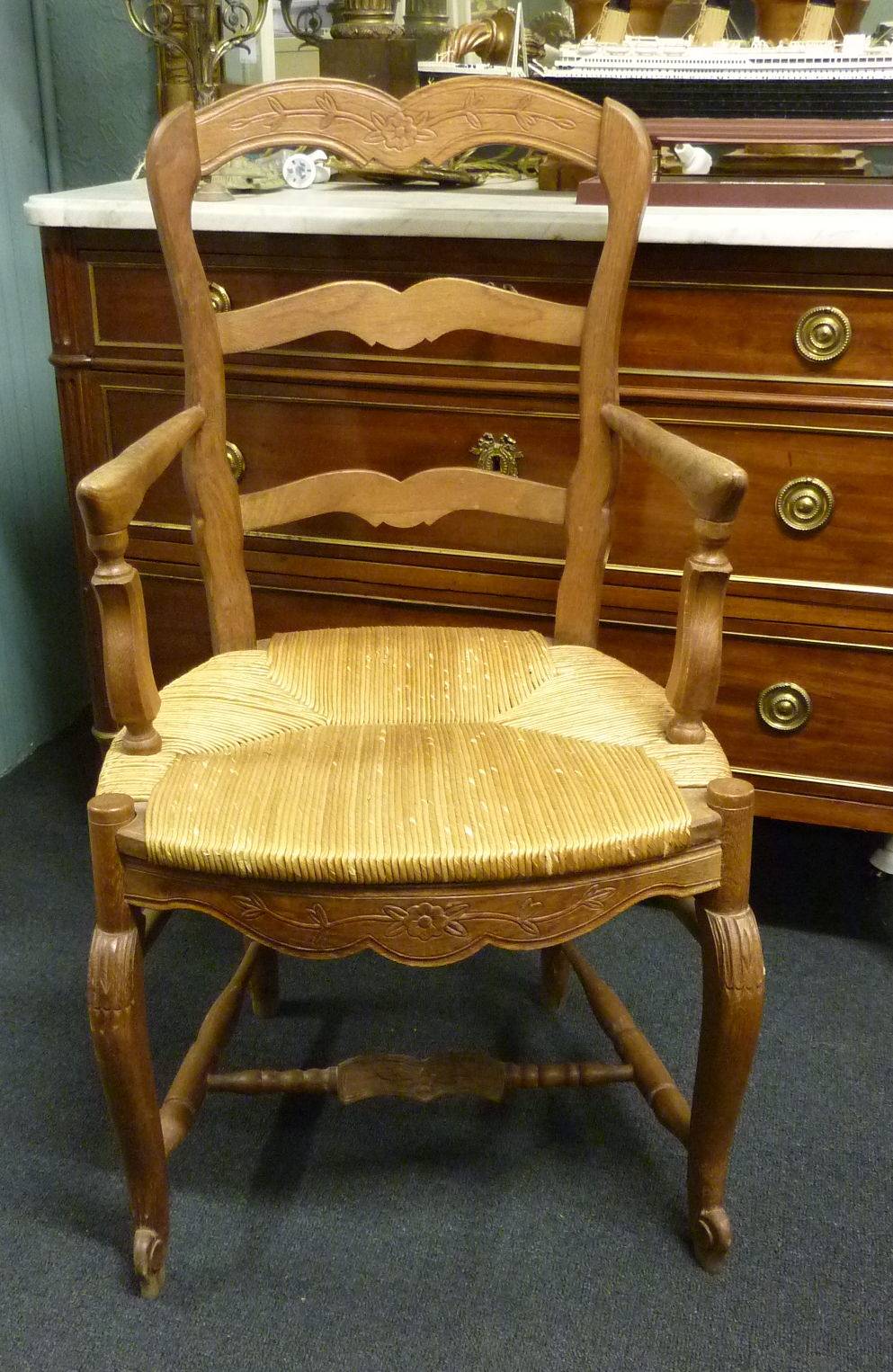 A pair of French Provincial Armchairs