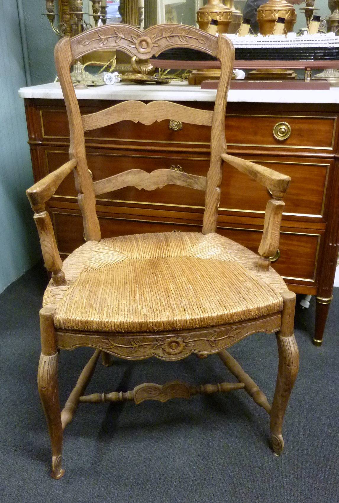 A pair of French Provincial Armchairs