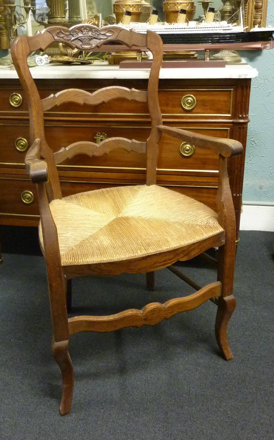 A pair of French Provincial Armchairs