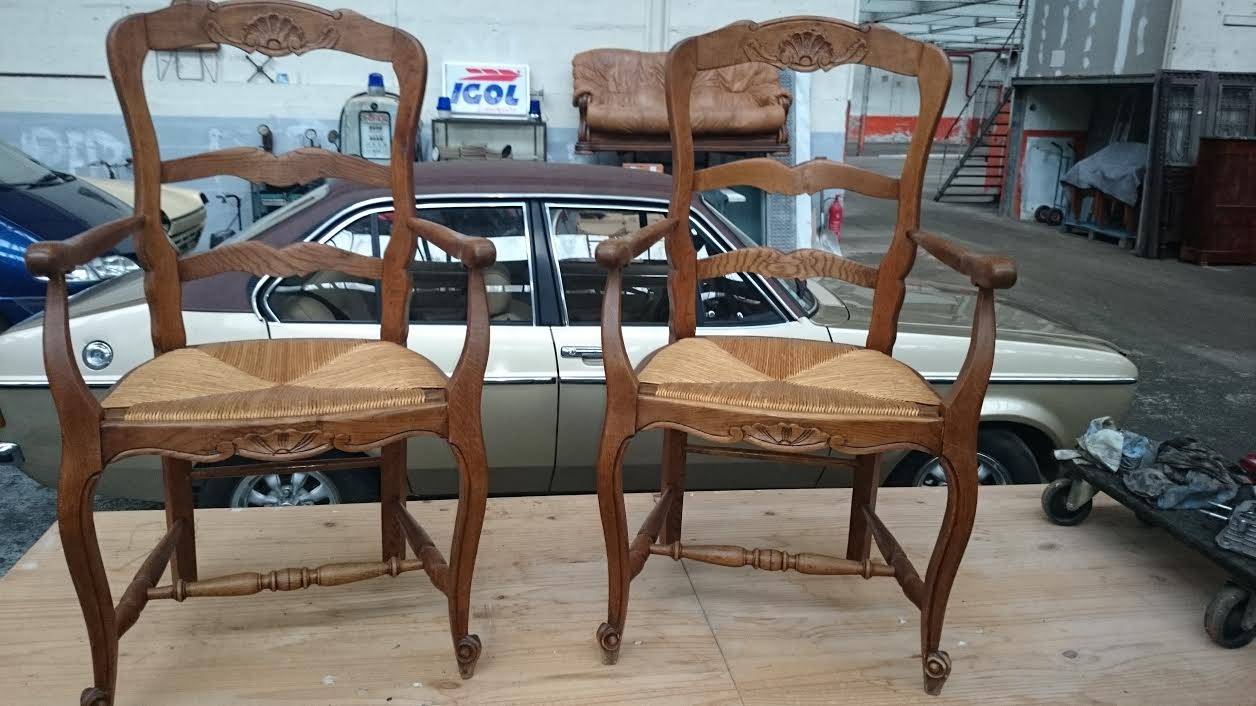A pair of French Provincial Armchairs