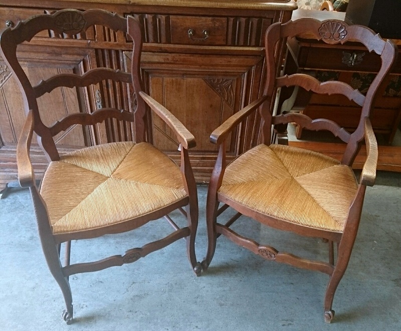A pair of French Provincial Armchairs