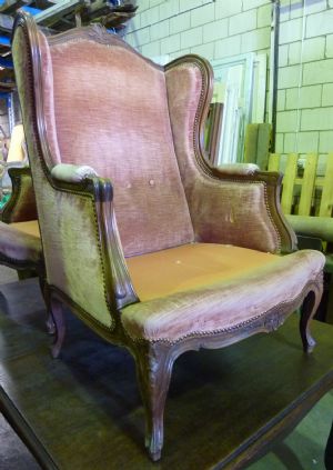 A pair of Louis LXV Wing-Back Armchairs
