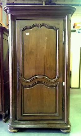 A French Regence Bonnetière Cupboard